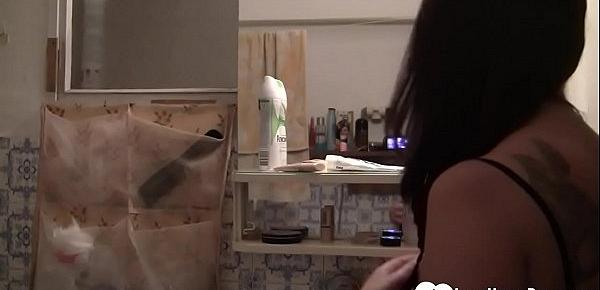  Hot brunette shows her big tits on camera